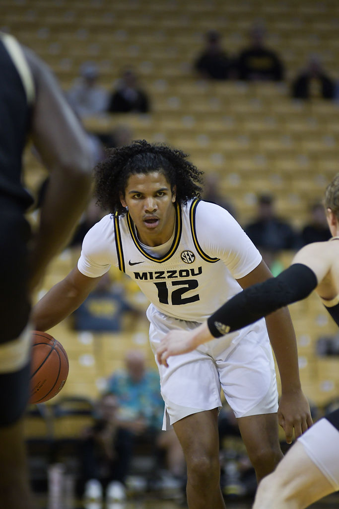 Mizzou player Dru Smith drives the ball down the court during the game against Wofford
